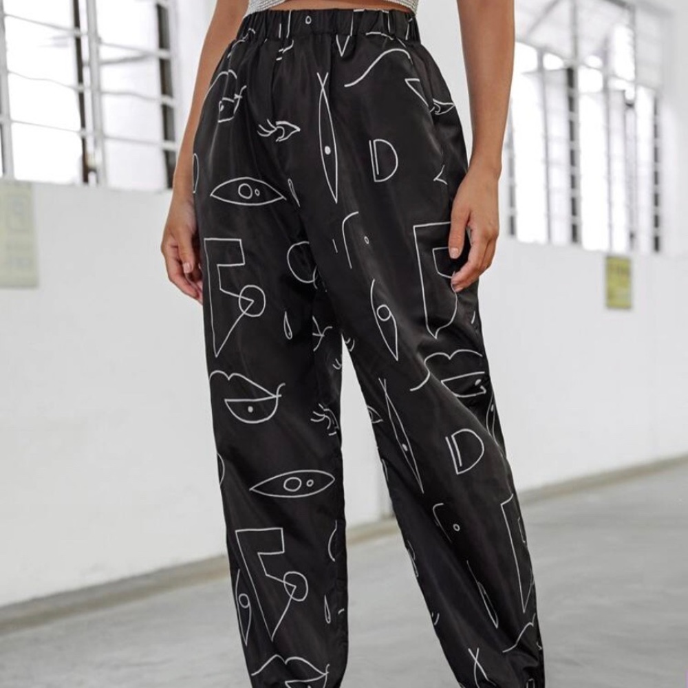 SHEIN graphic windbreaker pants